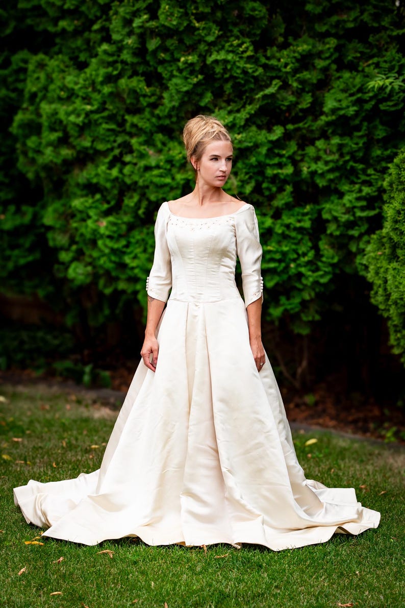 Ivory satin wedding gown